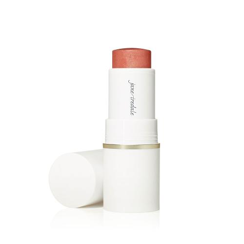 Na zdjęciu widzimy wielofunkcyjny kremowy stick Glow Time® Blush Stick marki Jane Iredale, ze zdjętą nakrętką dzięki czemu widzimy różowy odcień.