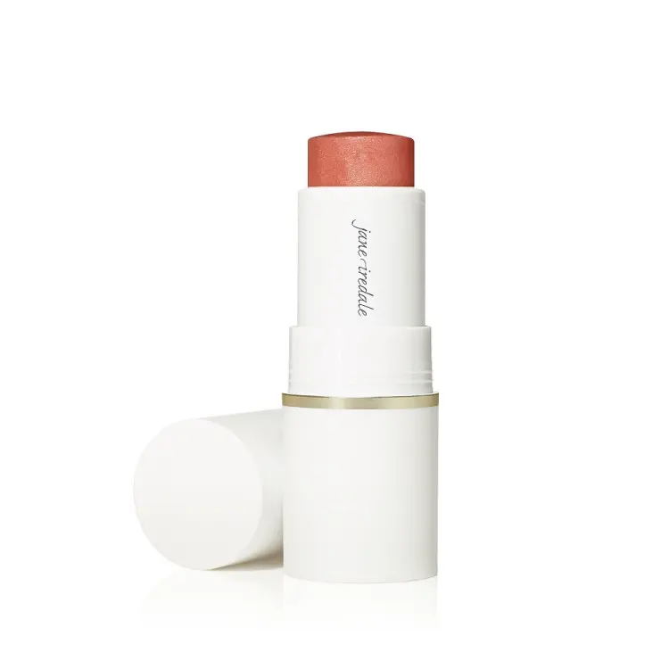 Na zdjęciu widzimy wielofunkcyjny kremowy stick Glow Time® Blush Stick marki Jane Iredale, ze zdjętą nakrętką dzięki czemu widzimy różowy odcień.