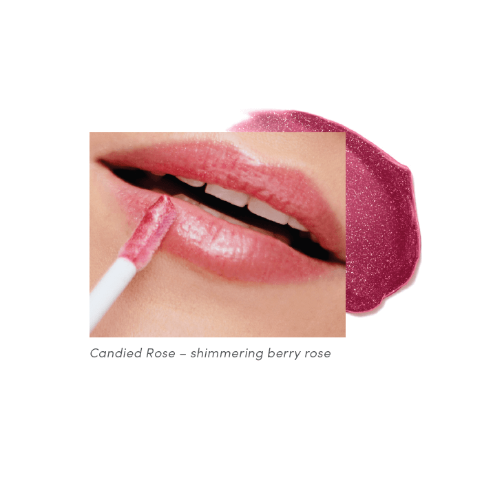 Na zdjęciu są usta modelki pomalowane odcieniem Candied Rose z błyszczyków HydroPure Hyaluronic Lip Gloss marki jane iredale. Soczysty, chłodny róż z wyraźną malinową nutą,  z wykończeniem błyszczącym i iskrzącym – pełnym subtelnych drobinek