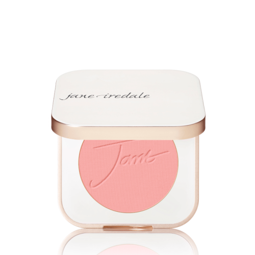 Na zdjęciu widoczny jest róż do policzków jane iredale w odcieniu awake, zamkniętych w kwadratowym, eleganckim kompakcie z białą pokrywką i złotym wykończeniem.