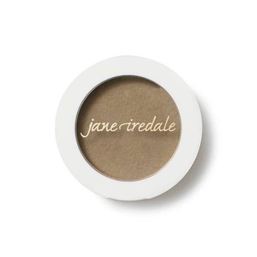 Okrągłe opakowanie pudru do brwi jane iredale PureBrow Brow Powder. Produkt znajduje się w  minimalistycznym pojemniku z białą ramką i przezroczystym wieczkiem przez które widoczny jest odcień pudru. Na wieczku znajduje się logo jane iredale.