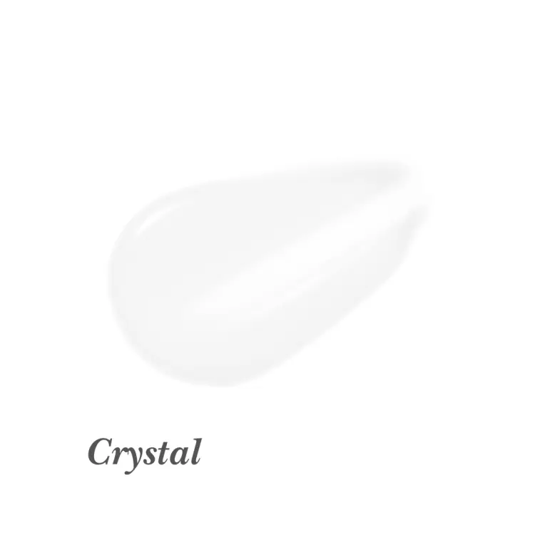 Na obrazku widoczny jest odcień błyszczyka do ust Jane Iredale o nazwie Crystal. Crystal to transparentny, bezbarwny błyszczyk. To uniwersalny produkt, który pasuje do każdego makijażu i koloru ust.