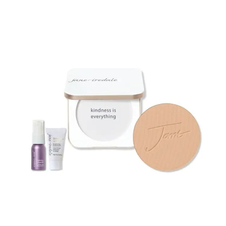 Na zdjęciu widzimy produkty składowe zestawu skincare make up jane iredale tzn: biała puderniczka, puder prasowany, mini baza i mini woda nawilżająca.