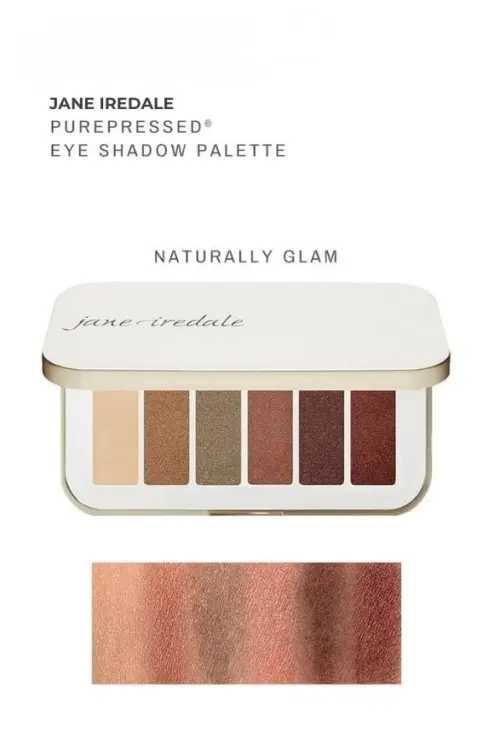 Paleta cieni do powiek jane iredale Naturally Glam. Paleta zawiera sześć ciepłych, rozświetlających odcieni. Na dole widoczne są swatche pokazujące metaliczne i satynowe wykończenie kolorów.