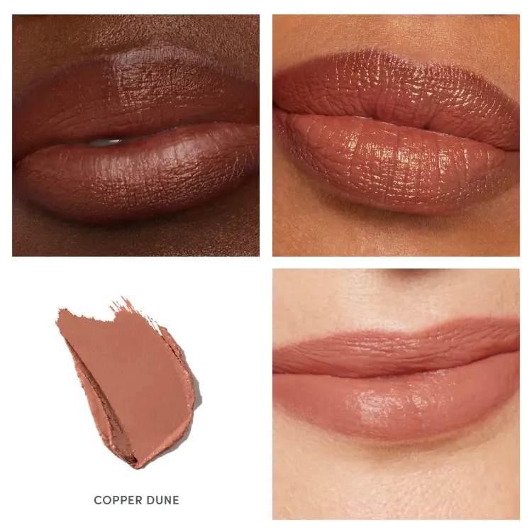 Na zdjeciu szminka Jane iredale w odcieniu Copper Dune, pokazana na ustach modelki. To połączenie delikatnego brązu z miedzianym, lekko rudo-złotym połyskiem. Idealny dla podkreślenia ust naturalnym, ale wyrazistym kolorem o satynowym wykończeniu.