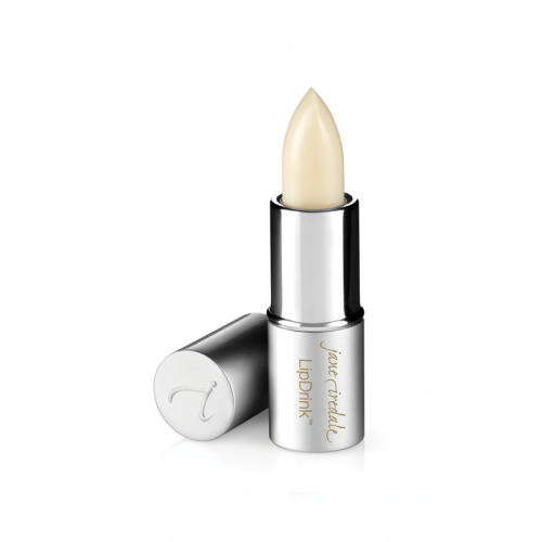 Na zdjęciu znajduje się MINI balsam do ust LipDrink® Lip Balm marki Jane Iredale w formie szminki. Produkt umieszczony jest w eleganckim, srebrnym opakowaniu z delikatnym logotypem marki na zakrętce.
